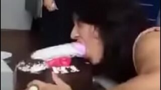 Indian girl sucking penis cake at office