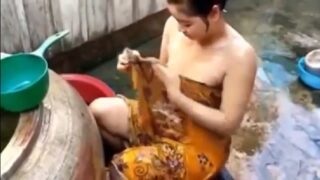 Hot indian girl bathing in open place