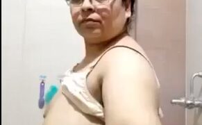 Indian buddi aunty showing big tits