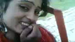 Pressing boobs of shy homely wife in park