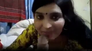 Desi hijra smiling and sucking penis of client